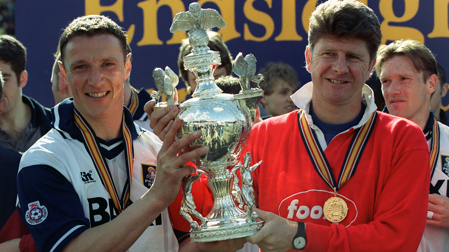 Skipper Ian Bryson and manager Gary Peters with the third division trophy in 1996
